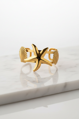 Plated Metal Bracelet with Seashell and Starfish Design