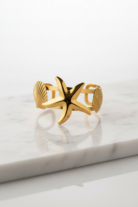 Plated Metal Bracelet with Seashell and Starfish Design