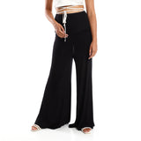 Red circle -  Solid Pattern Flare Fit Pants