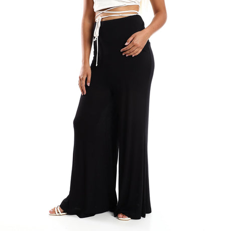Red circle -  Solid Pattern Flare Fit Pants