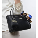Booria - Handbag with a cross handle for women