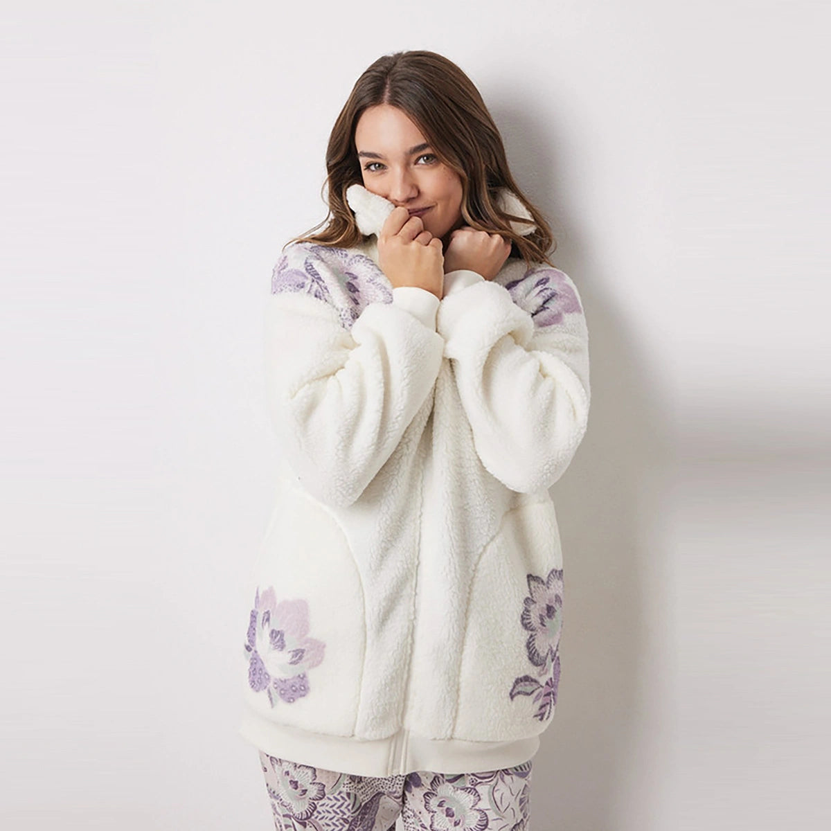 Women Secret	- Short shearling jacket with flowers - sold by FIG