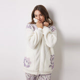 Women Secret	- Short shearling jacket with flowers - sold by FIG