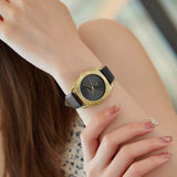 TRNDA Women's Watch with Gold Stainless Steel Case and Black Leather Band